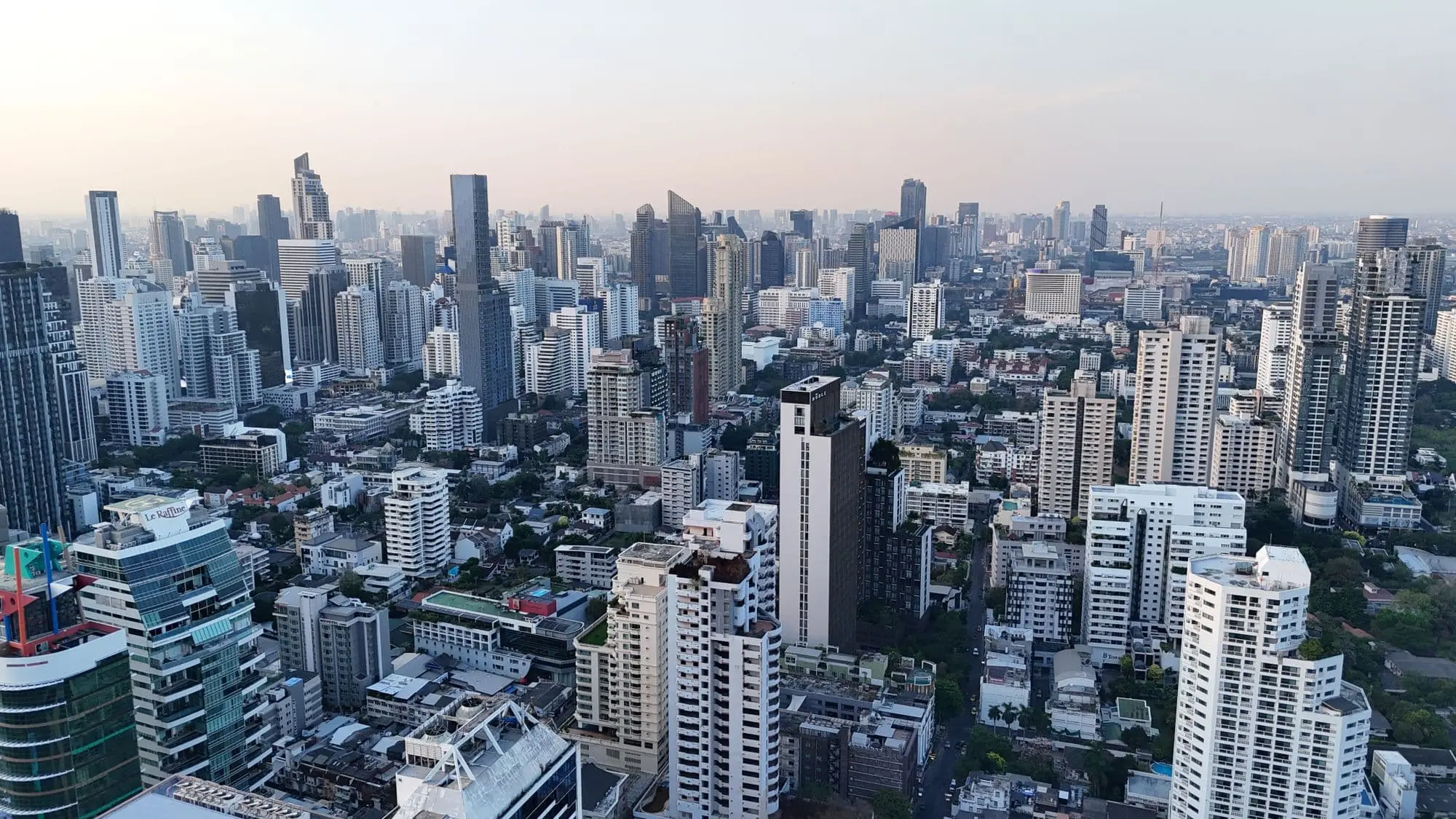 Aerial view of the Bangkok skyline at dusk